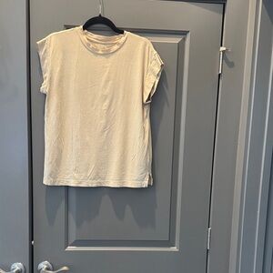 a new day Cream Muscle Tee